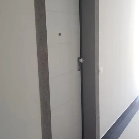 - Helios Apartment Shengjin